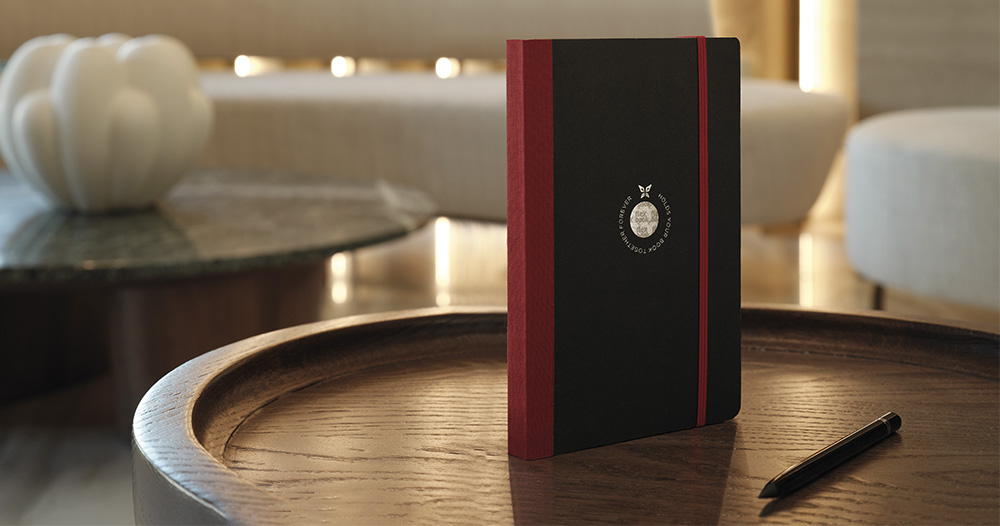 a notebook on a table of a hotel 